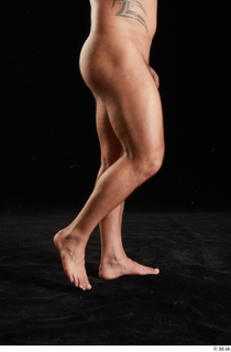 Grigory  1 calf flexing nude side view 0002.jpg